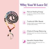 A multi-colored 108 mala beads necklace with lava rock amethyst tiger eye stones and tree of life pendant for meditation