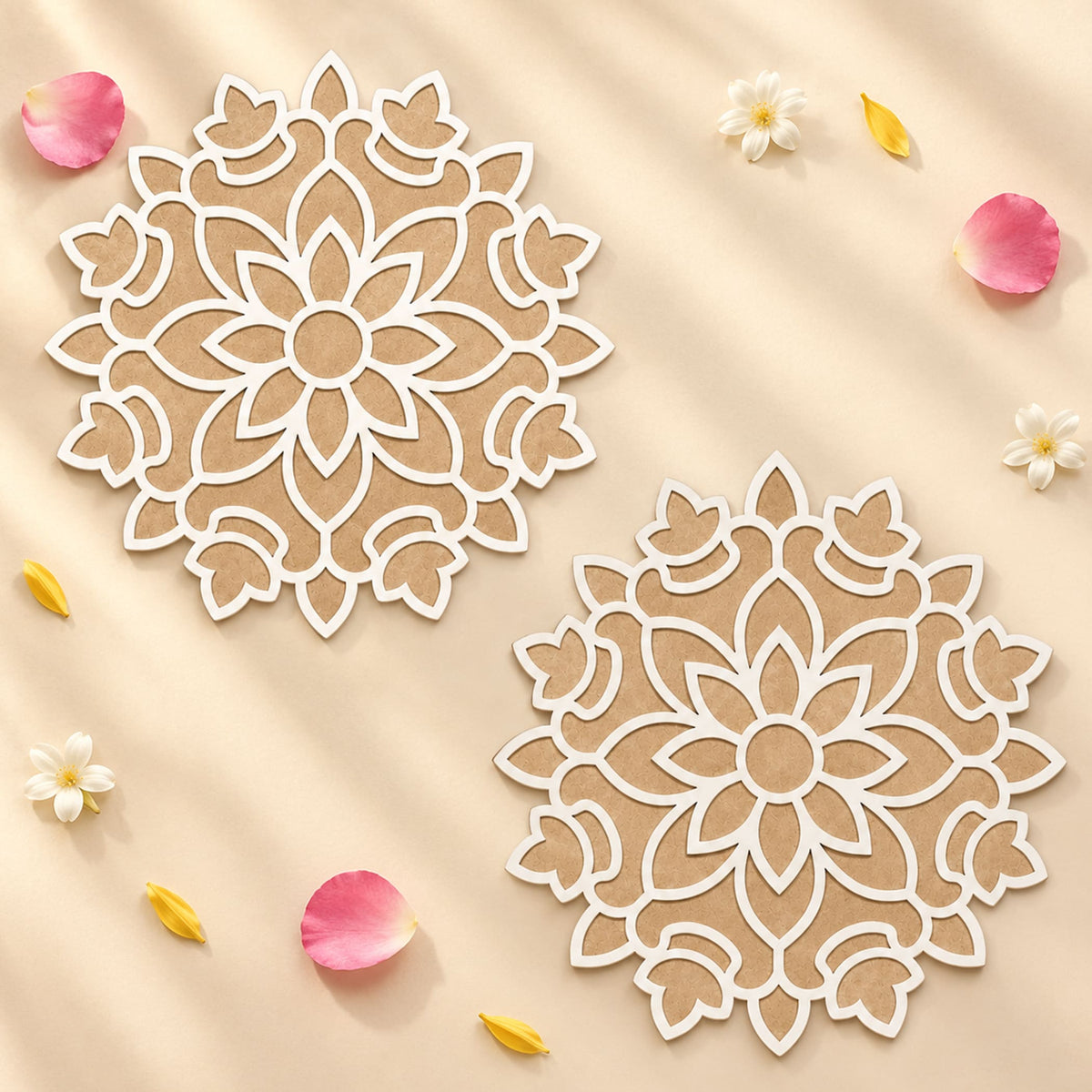 Two white intricately cut mdf mandala coasters with floral design on beige background for diwali rangoli decoration
