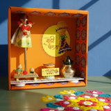 Orange readymade Gudi Padwa decoration box with festive interior and Happy Gudi Padwa greeting