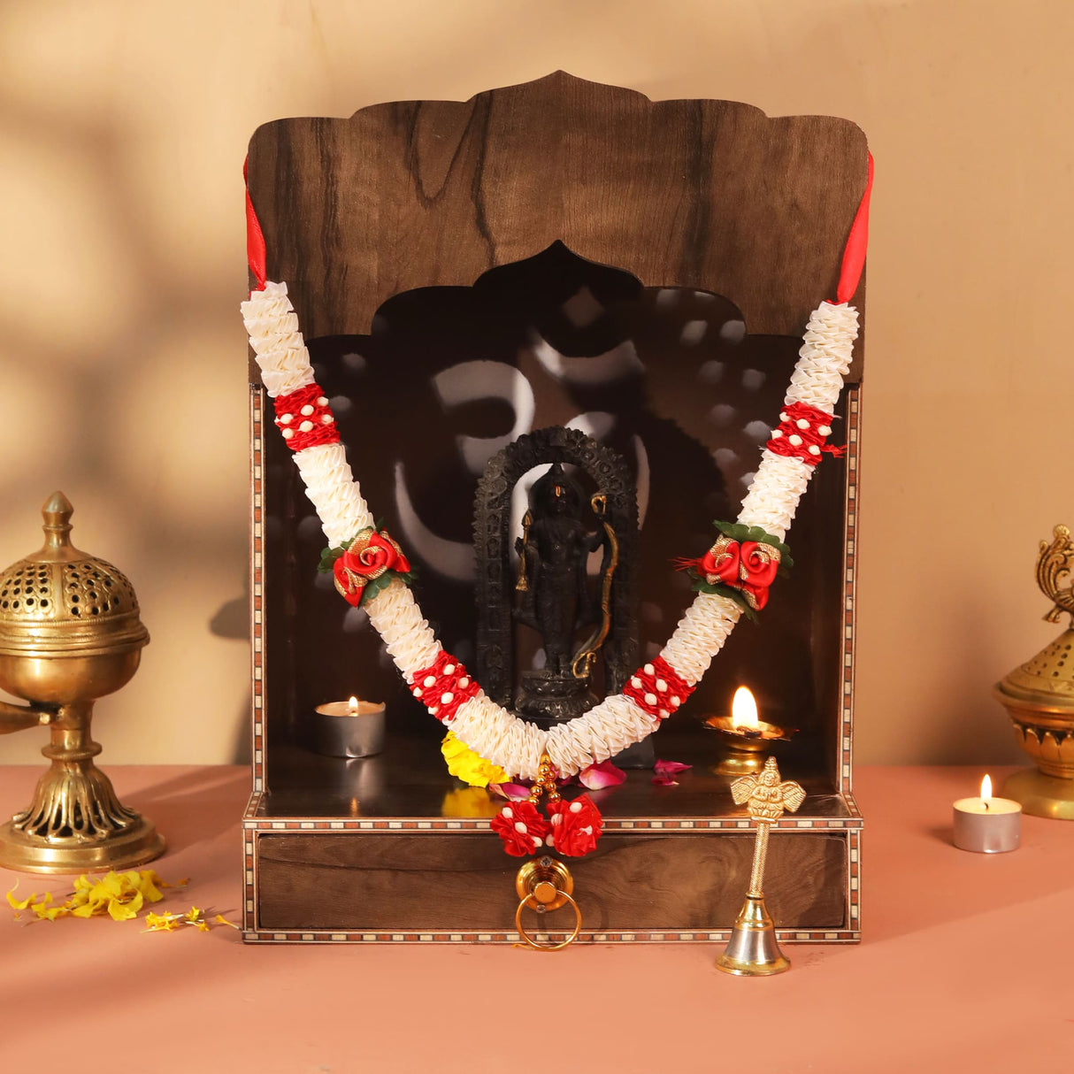 Dark wooden altar with Om symbol, black deity statue in 12-inch idol mala garlands