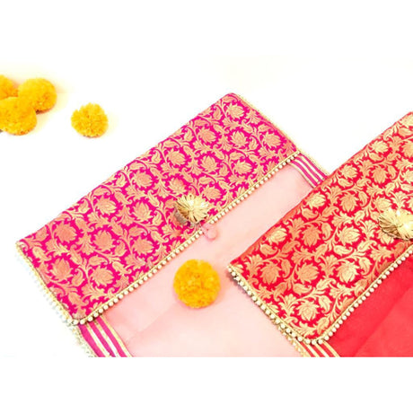 Pink and orange brocade clutch with gold accents for saree storage and gifting