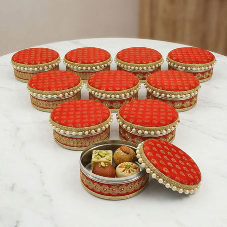 Four ct steel ladoo box with red and gold patterned fabric and pearl edges stainless steel sweets gift box for festivals
