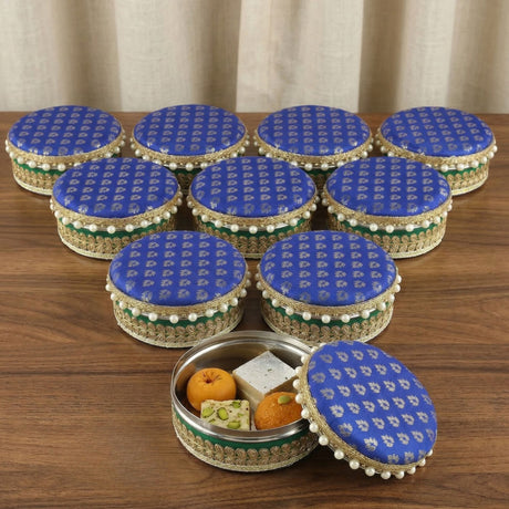 Blue and gold decorative 4 ct steel ladoo box with intricate patterns and pearl trimmings for festive sweets gift
