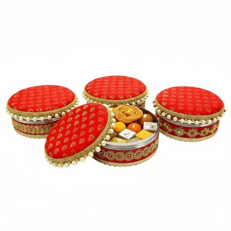Decorative red and gold stainless steel sweet gift box with intricate patterns and pearl accents for festivals
