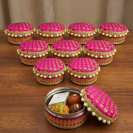 Pink and gold patterned fabric covered 4 ct steel ladoo box with pearl trim perfect for Holi Diwali sweets gift