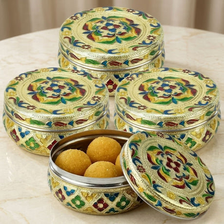 Ornate gold and multicolored enamel meenakari stainless steel small round decorative sweet box with golden laddu inside