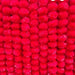 Bright red pom-pom garlands for Ugadi decoration in Indian decor arrangements