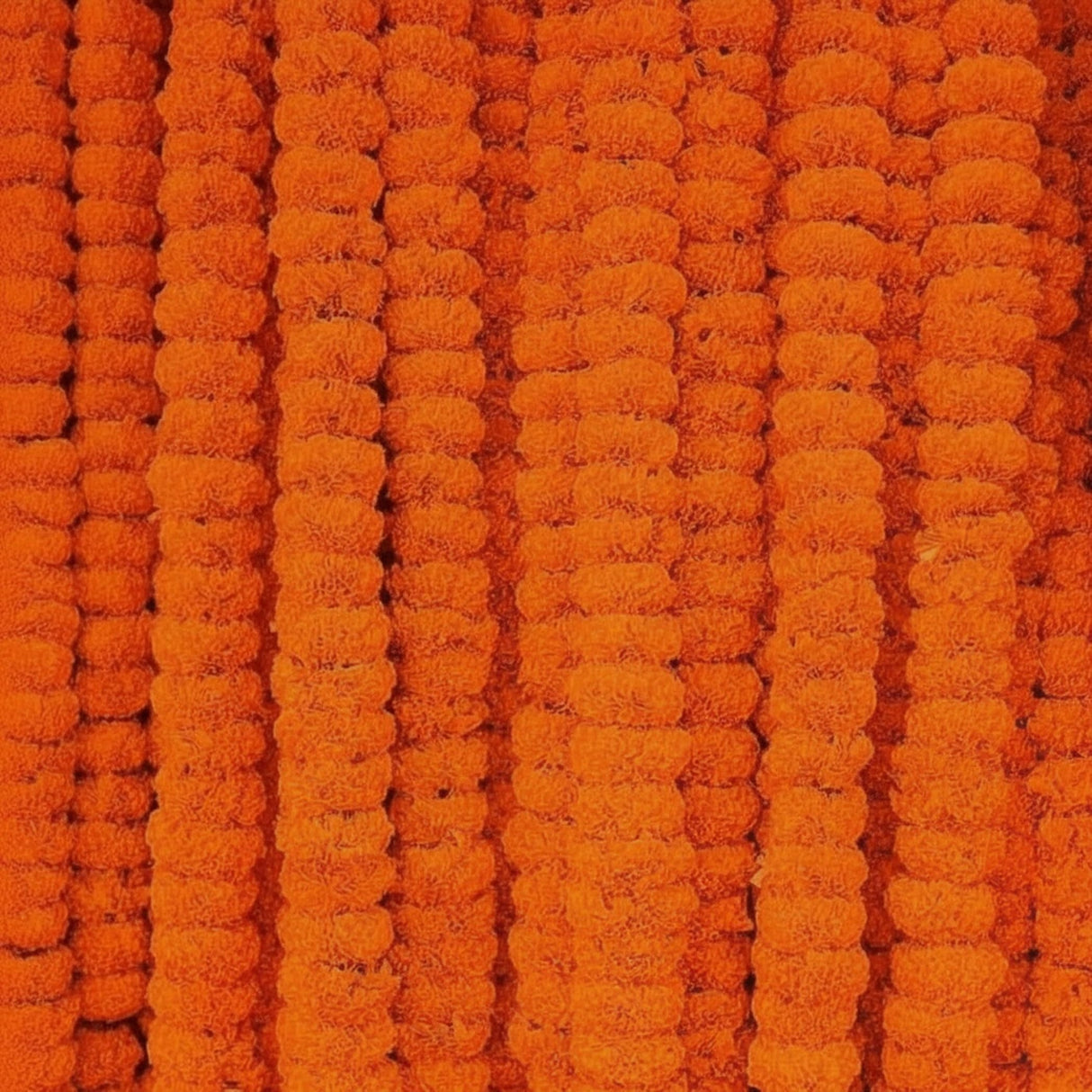 Orange pom-pom trimmings on fabric for 5ct Artificial Marigold Strings Ugadi Indian Decor