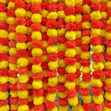 Strings of artificial red and yellow marigold flowers for Ugadi and Indian decoration