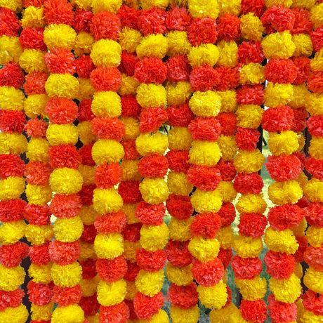 Strings of artificial red and yellow marigold flowers for Ugadi and Indian decoration