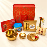 Red ornate gift box with gold patterned design in raksha bandhan gift hamper set for brother and bhabhi