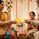 Yellow shagun envelope with gold tree design for Indian weddings