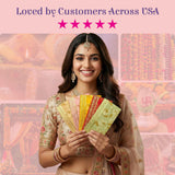 Woman in Indian outfit holds colorful gold foil shagun money envelopes