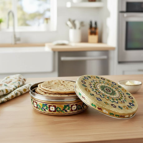 Ornate round stainless steel decorative bread box with flatbreads and lid for storage