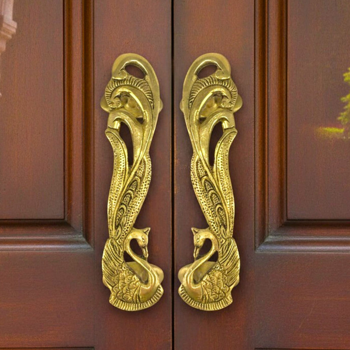 Golden brass peacock door handles, 7 inch pair with intricate feather details