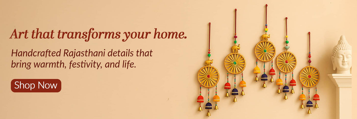 Decorative hanging ornaments with colorful patterns on a beige background, accompanied by text promoting handcrafted Rajasthani art.