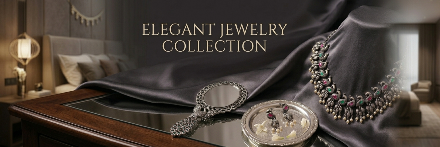 Jewelry collection on a dark fabric with 'Elegant Jewelry Collection' text in a luxurious setting.