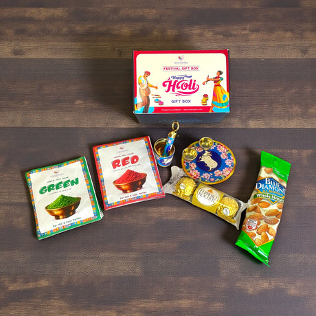 Holi Gift Box - 2 Natural Gulal Packets (Assorted Colors), Premium Hazelnut Chocolates, Whole Almonds, Cow Print Color Plate & Mini Pichkari Balti Showpiece - Festive Hamper