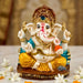 Acrylic ganesh statue 2.25 inch with white body gold accents turquoise yellow garments red face markings for home pooja