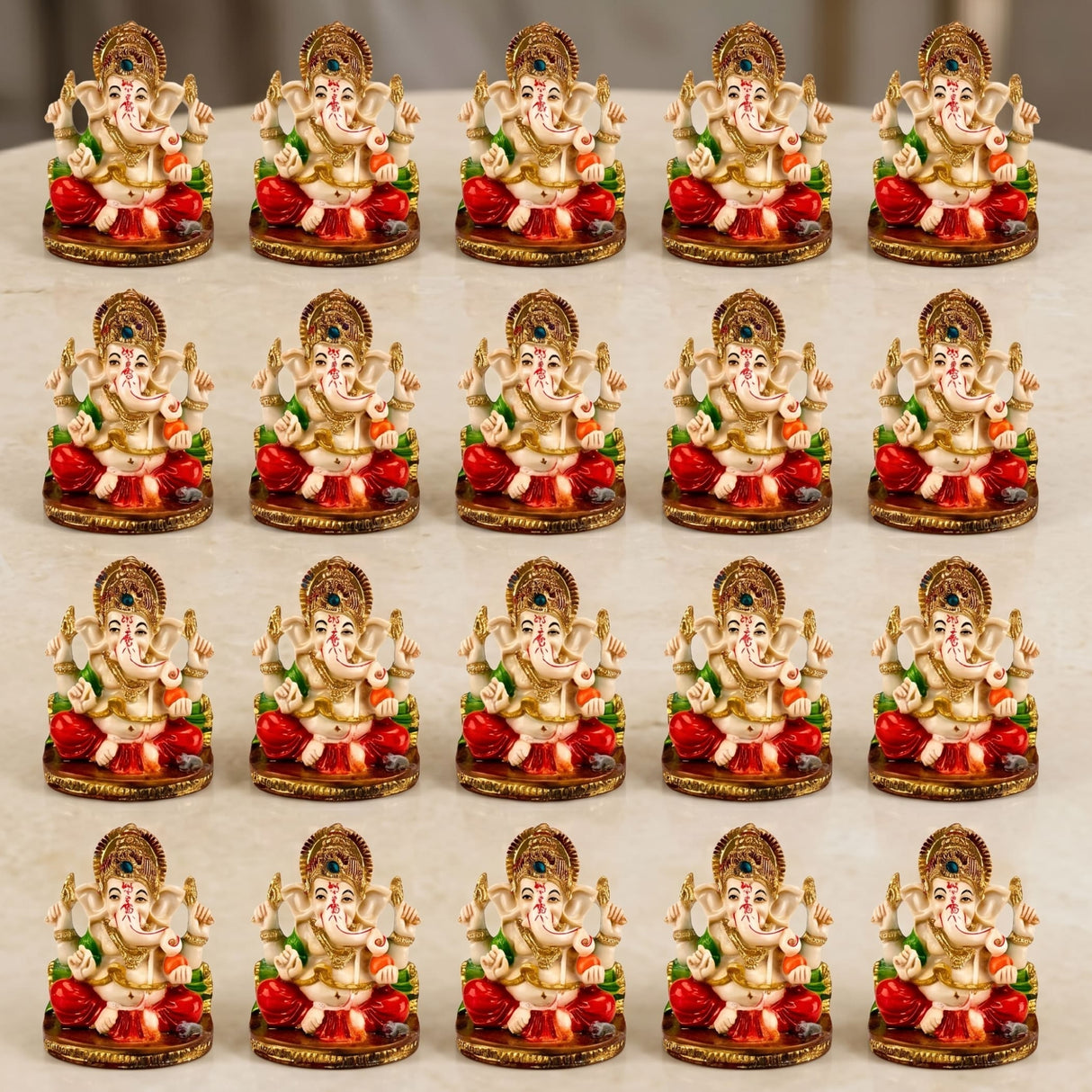 Acrylic ganesha idol in golden and cream with red green orange accents for home temple and festival decor