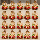 Acrylic ganesha idol in golden and cream with red green orange accents for home temple and festival decor