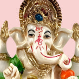 Golden white resin Ganesha statue 2.25 inch mini idol with gold details