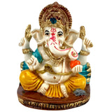 Detailed 2.25-inch white gold acrylic Ganesh statue in meditative pose