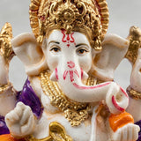 Detailed 2.25-inch white gold Ganesha acrylic statue with red markings, purple orange accents