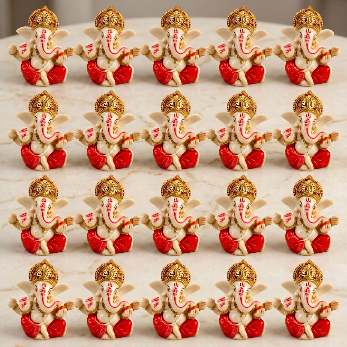 Red and gold acrylic ganesha idol with intricate detailing for home temple car dashboard and festival decor