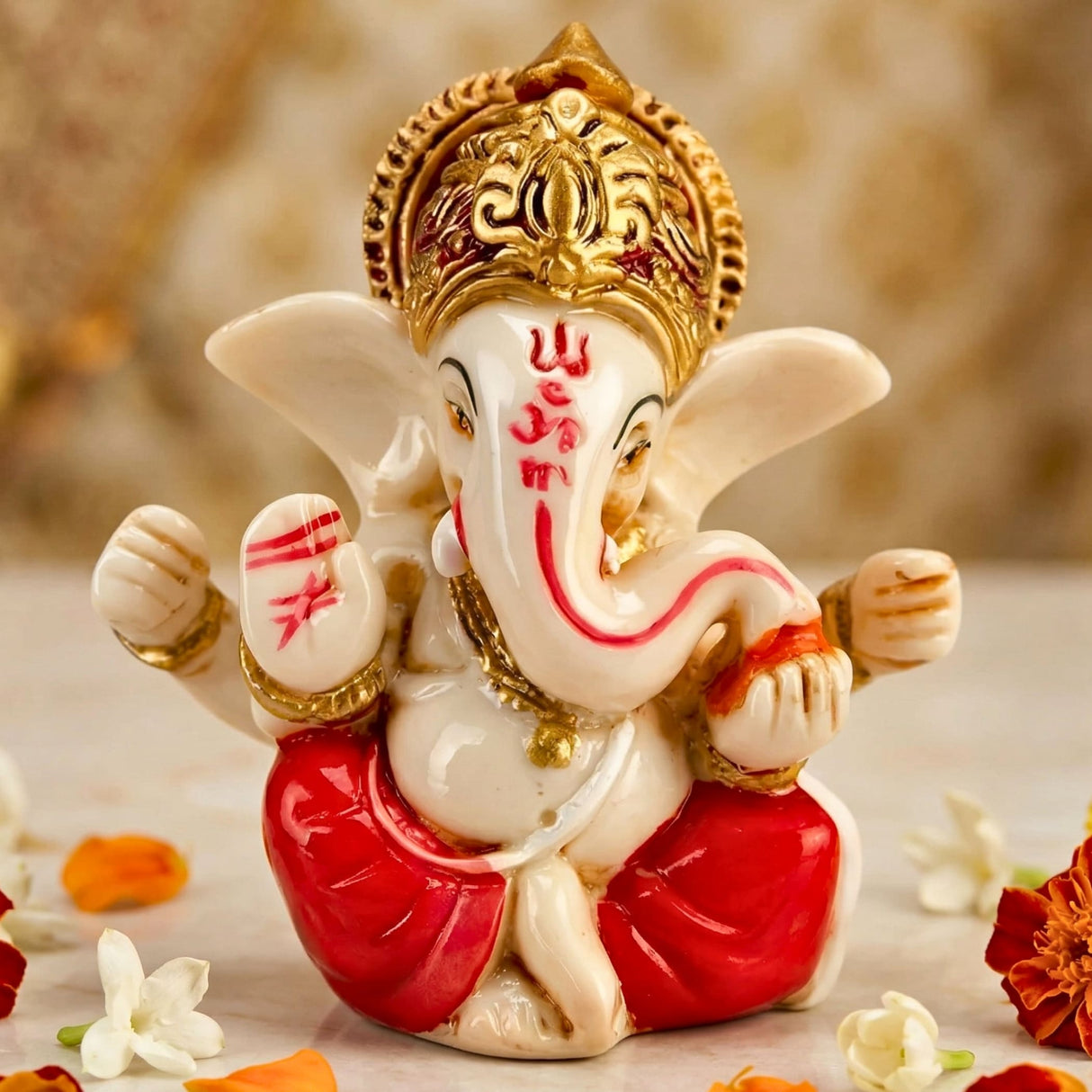 A glossy white and red acrylic car ganesha statue idol with gold accents for home decoration and car dashboard use