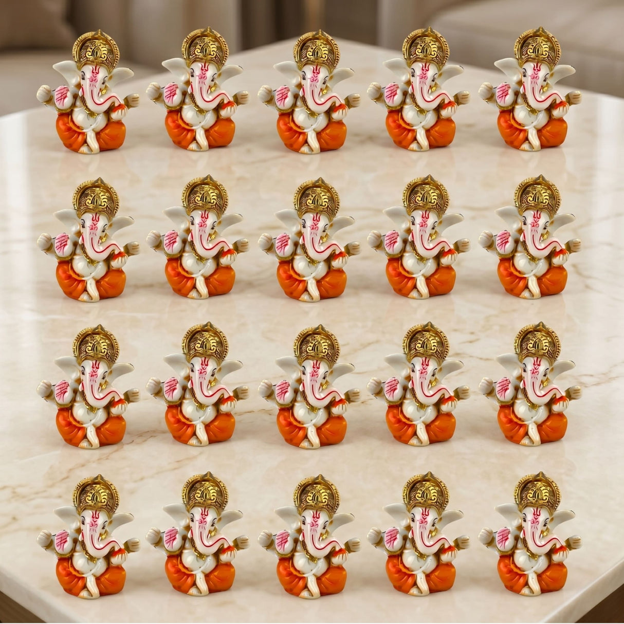 Set of fifteen acrylic ganesha idols with white body orange dhoti and golden crown for home temple and festival decor