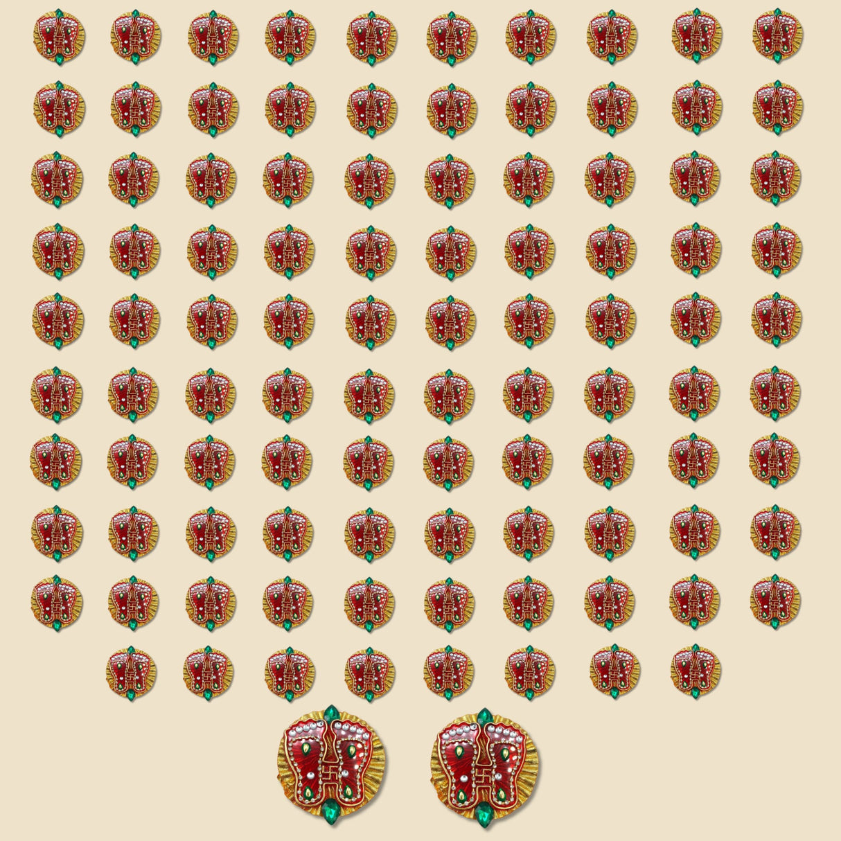Red and gold embroidered butterfly decorative buttons with green gemstone accents for acrylic lakshmi charan paduka design