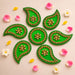 Green acrylic paisley-shaped rangoli with gold embellishments and floral motifs for traditional diwali and navratri decor