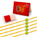 Set of five handmade yellow cord animal theme rakhis with green smiling face beads and pearl accents for brother