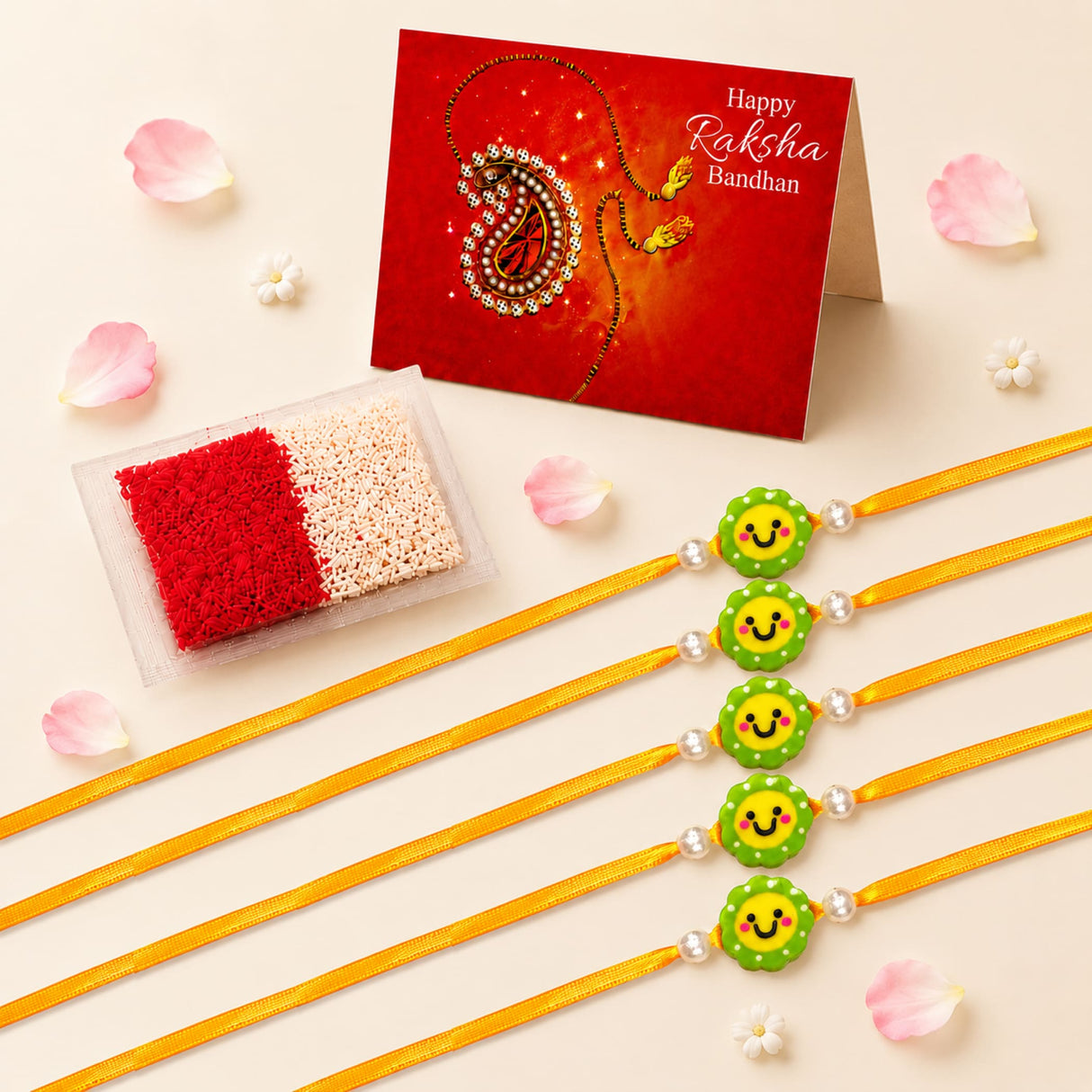 Set of five handmade yellow ribbon rakhis with green smiling face charms and pearl accents for raksha bandhan gift