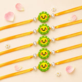 Animal theme rakhi for brother with five bright green smiling face charms on golden yellow adjustable threads