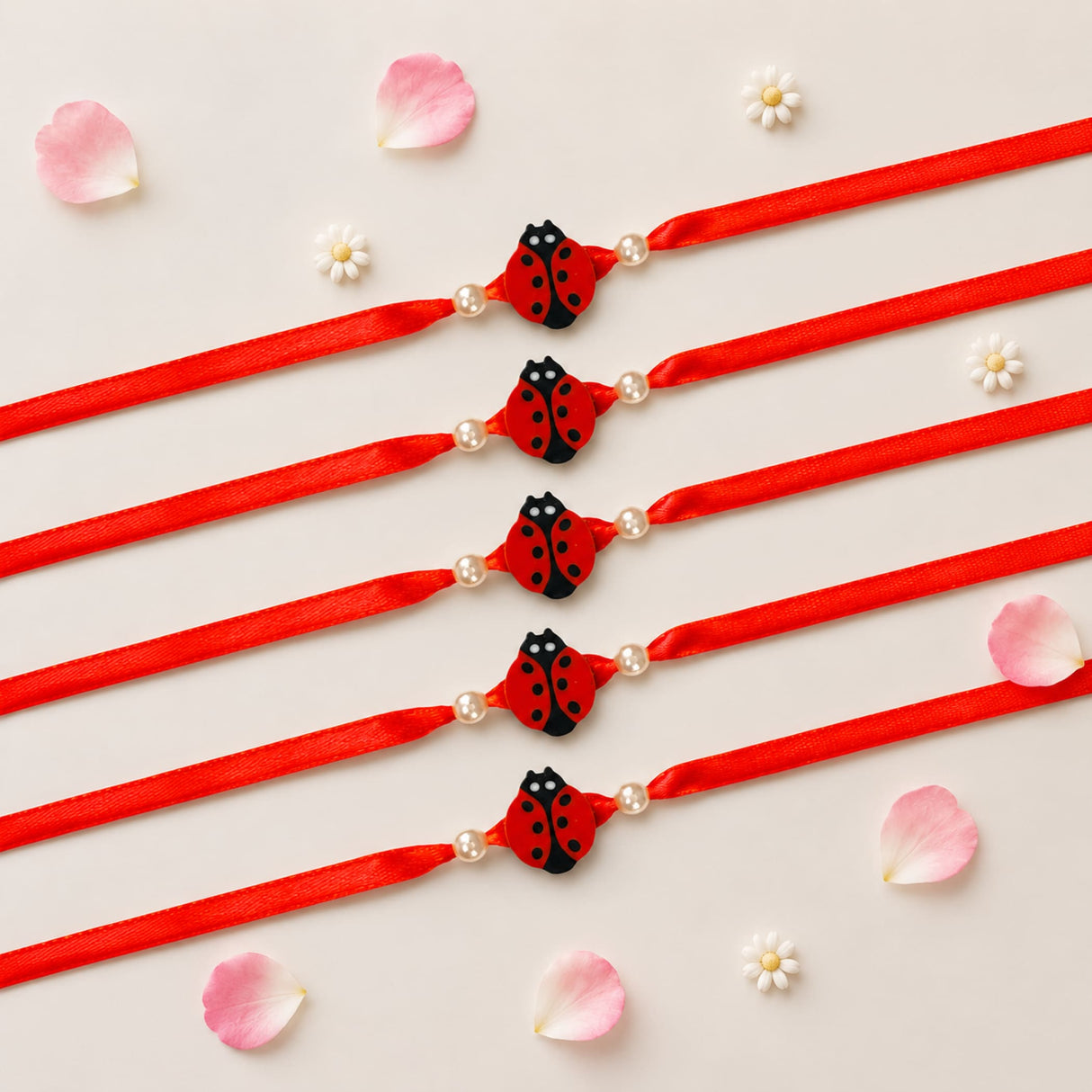 Red satin ribbon rakhi with black ladybug charm and pearl accents for brother handmade adjustable protection bracelet