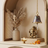Antique brass hanging bell with gold-toned chain and intricate blue purple orange enamel for temple pooja decor