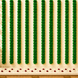Artificial marigold strings with green floral garlands and red white petals for diwali and day of the dead decor