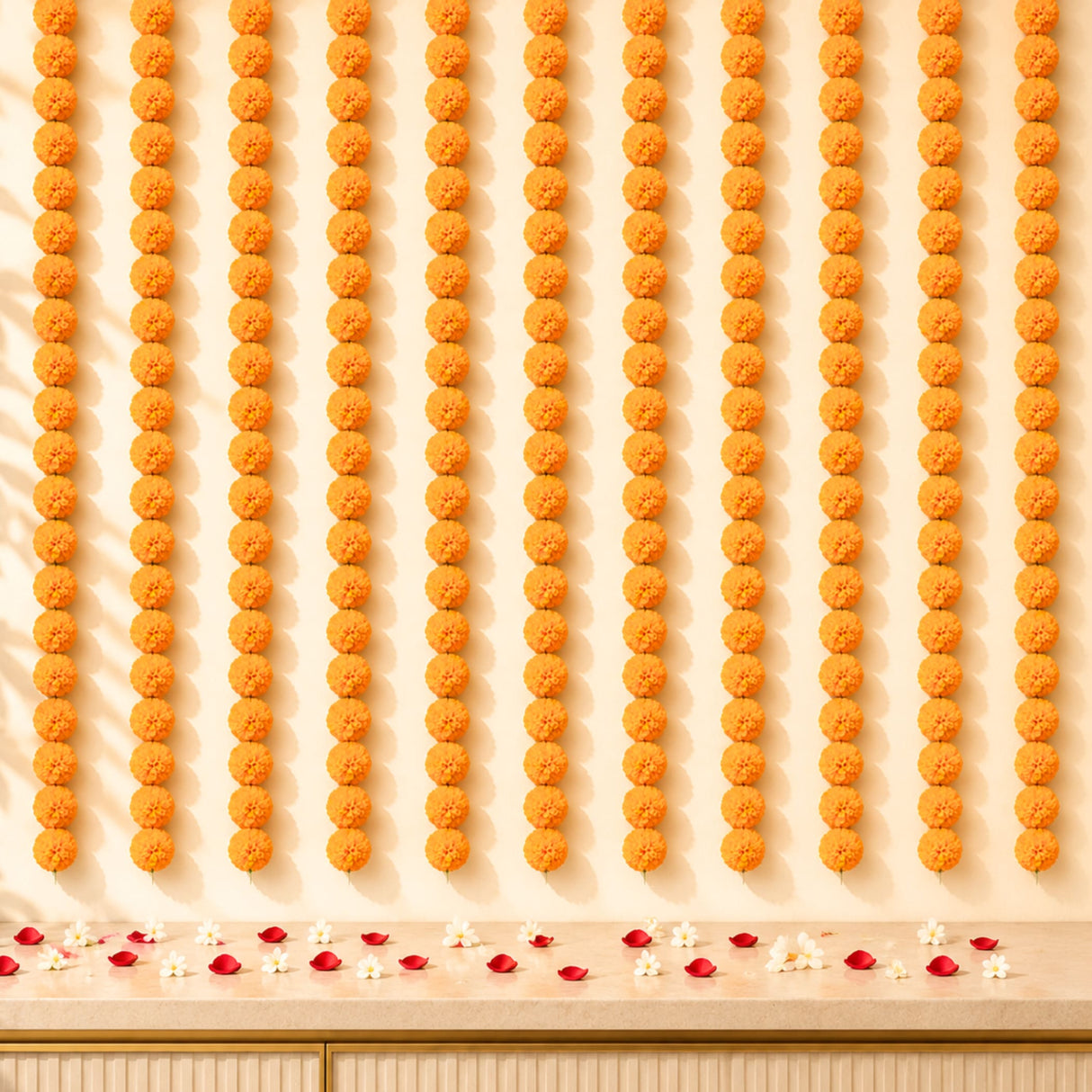 Rows of vibrant orange artificial marigold strings create a festive floral garland for Diwali and Day of the Dead decor