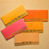 Vibrant textured money envelopes in yellow orange pink and beige with gold foil circular motifs for indian weddings and gifts