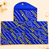 Vibrant blue brocade fabric clutch with yellow white geometric patterns and gold stitching for indian wedding cash gifts
