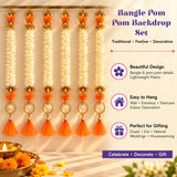 Set of six bangle pom pom hanging backdrop garlands with golden metallic bangles, orange pompoms, and white floral tassels for festive decor