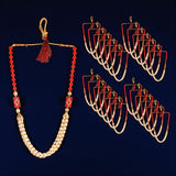 Gold and red beaded necklace with tassel pendant and artificial moti pearls for weddings
