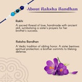 A blue and white beaded designer rakhi with a black eye motif handmade for brother and bhabhi gift