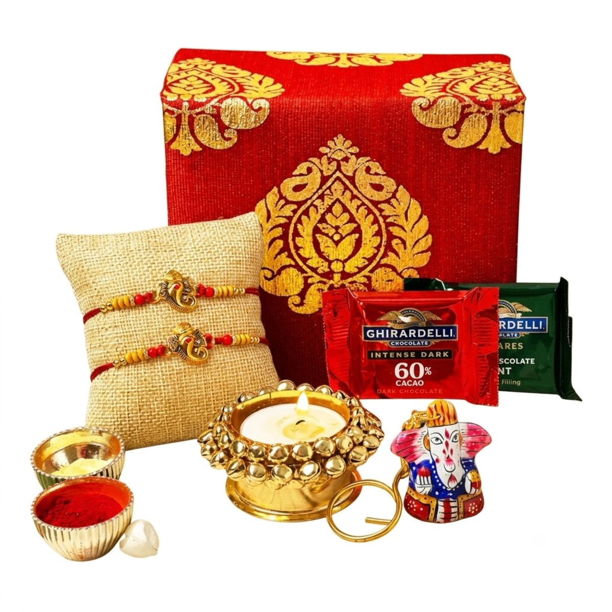Red and gold ornate paisley gift box from Bhai Dooj hamper with rudraksha rakhi bracelet set and traditional items