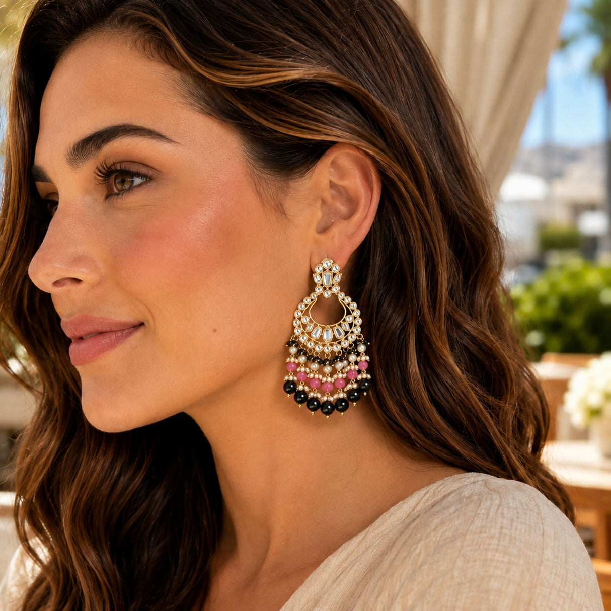 Elegant oversized Indian Kundan and faux pearls gold tone chandelier earrings with crystals pink and black beads for ethnic wear
