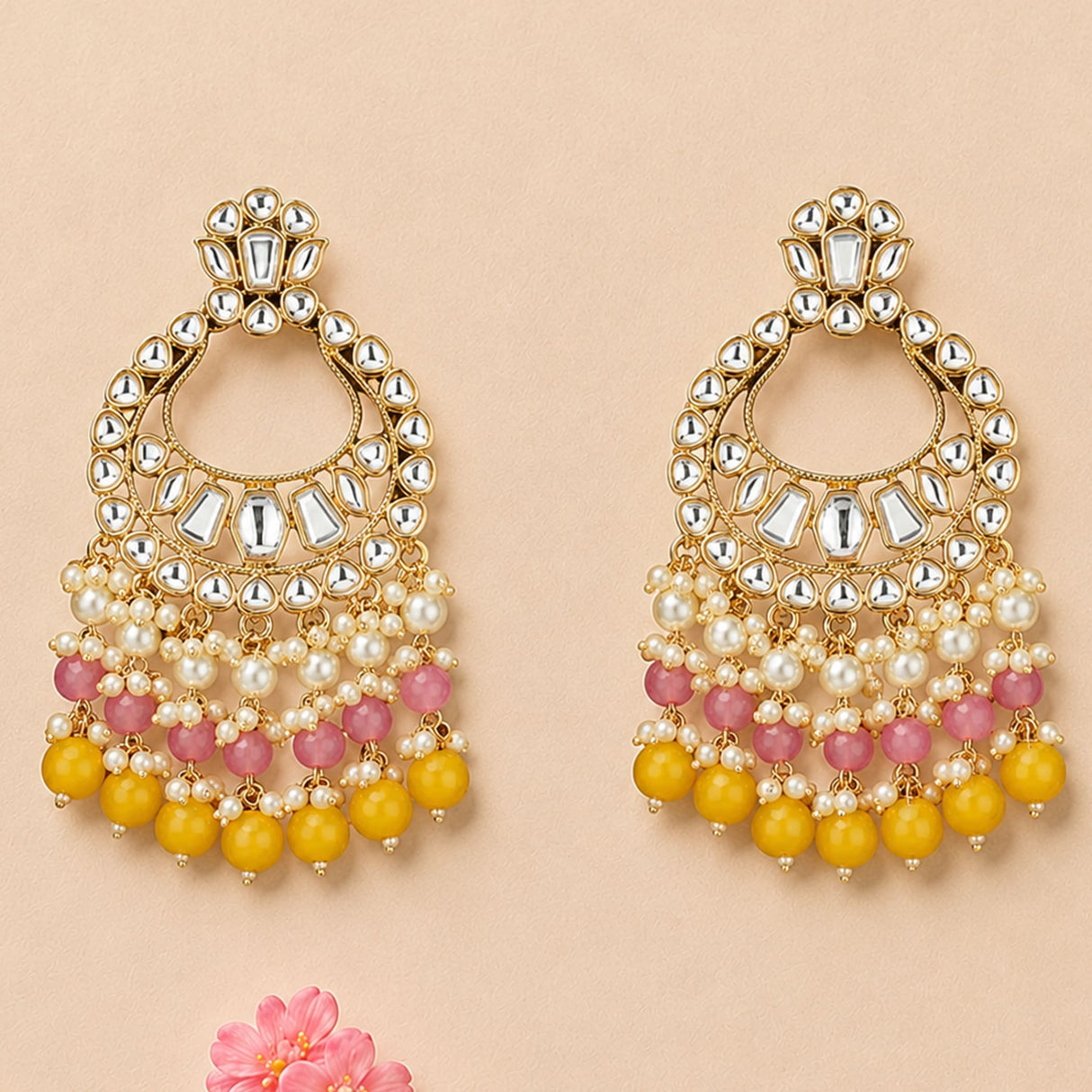 Gold tone oversized Indian kundan chandelier earrings with clear stones pink and yellow beads and white pearls for ethnic wear