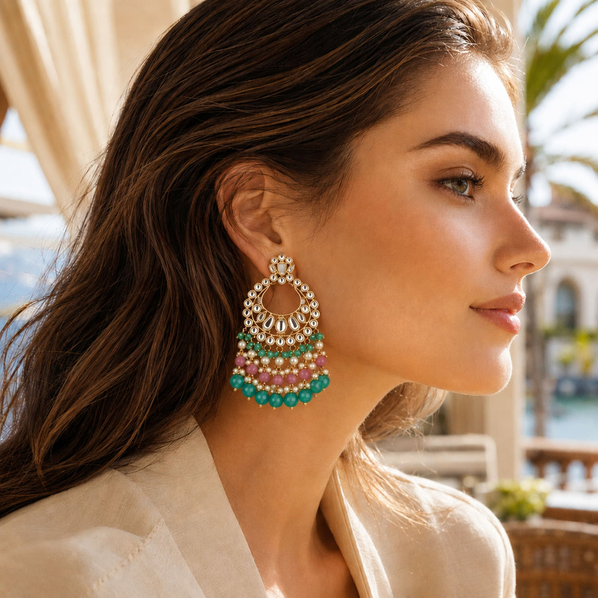 Gold tone oversized Indian kundan chandelier earring with layered turquoise pink and green beads for wedding and ethnic wear
