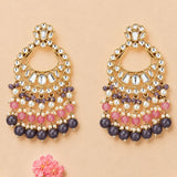 Oversized gold tone kundan chandelier earrings with clear stones and pink white dark purple faux pearl beads for ethnic wear